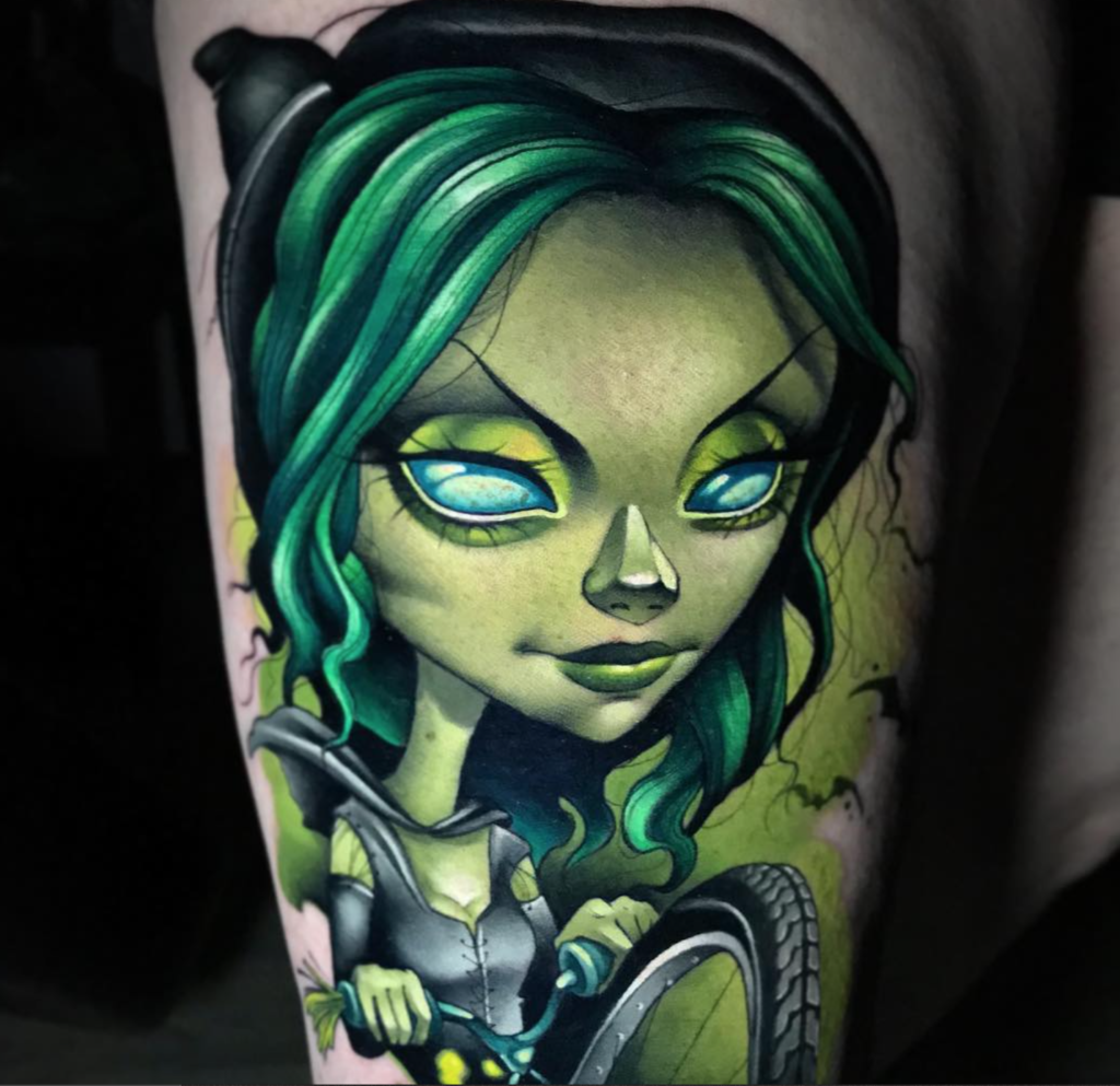 Kelly Doty green tattoo