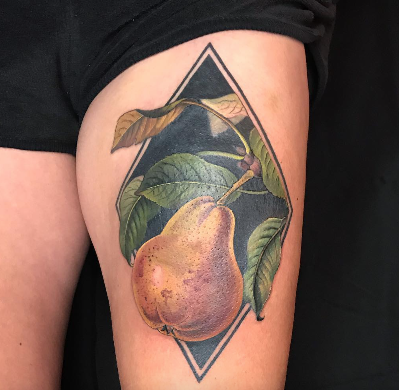Esther Garcia pear tattoo