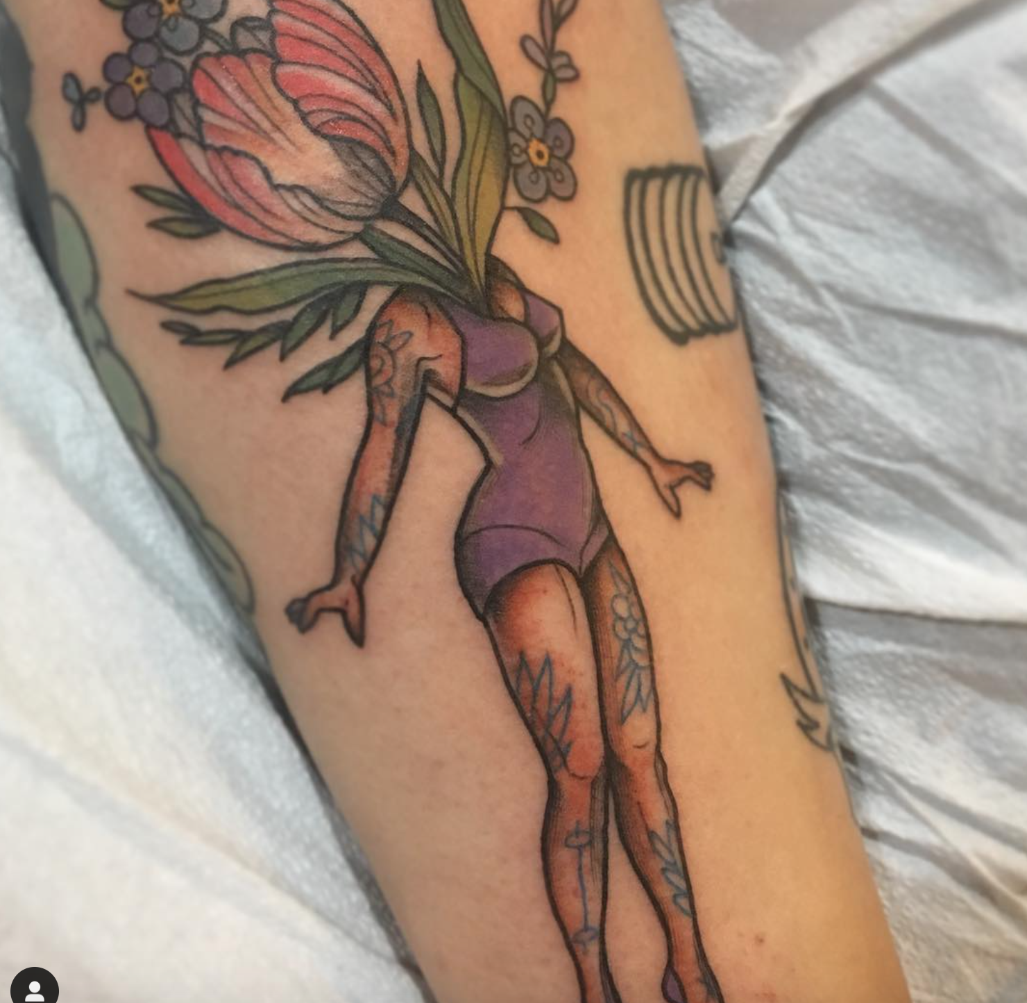 Emilie Robinson strong floral babe tattoo