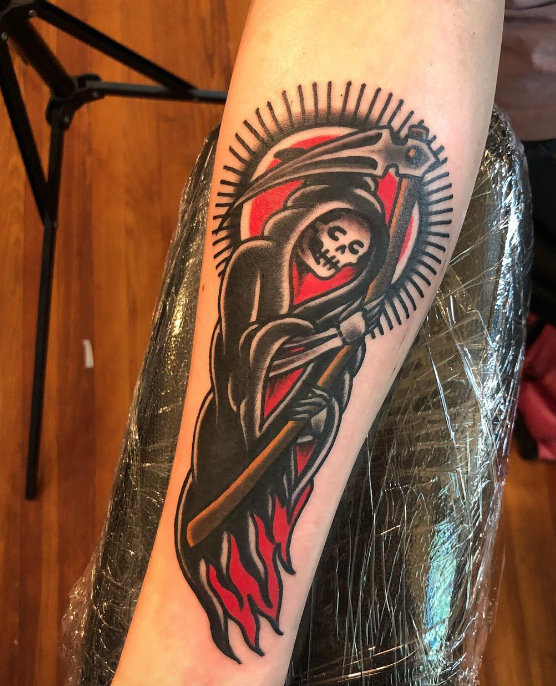 Kate Collins reaper tattoo