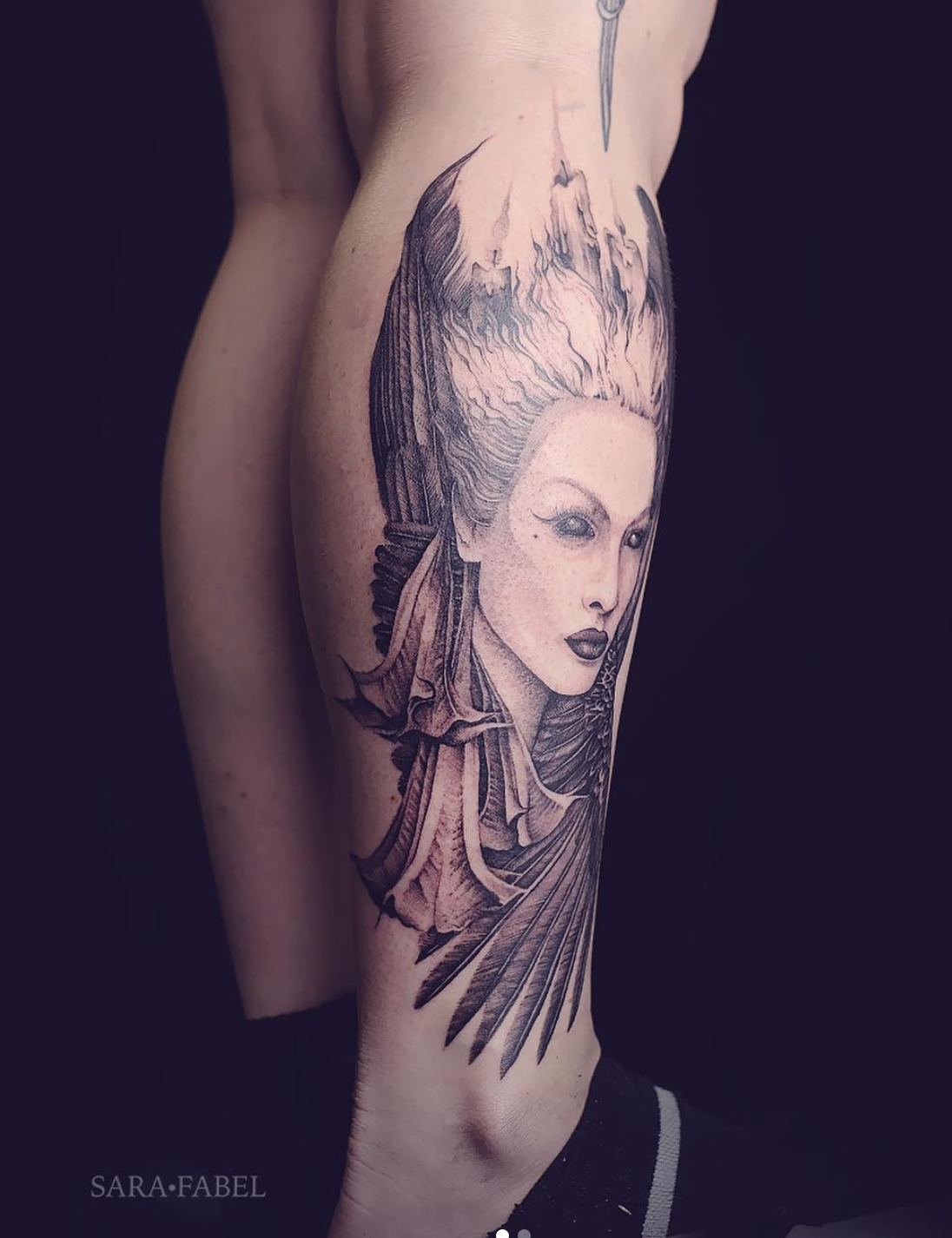 Sara Fabel lady head tattoo