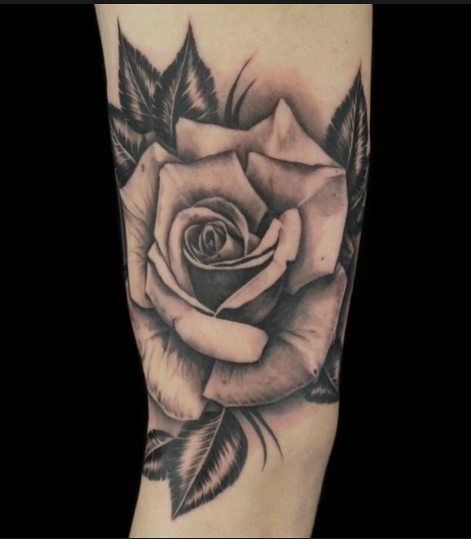 Rose tattoo by Ashley Anoneison