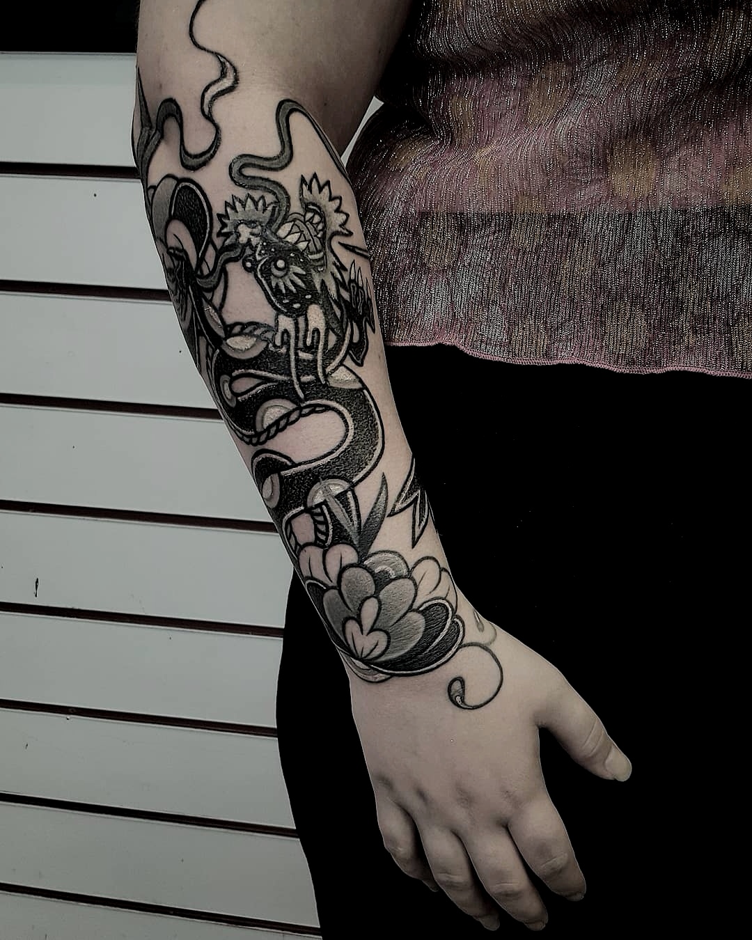 Snake tattoo by Hannah Pixie Snowdon