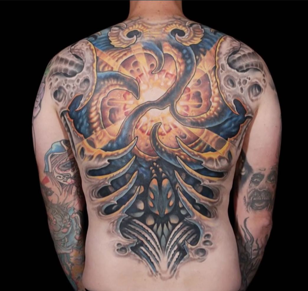 Dani Ryan finale back piece tattoo