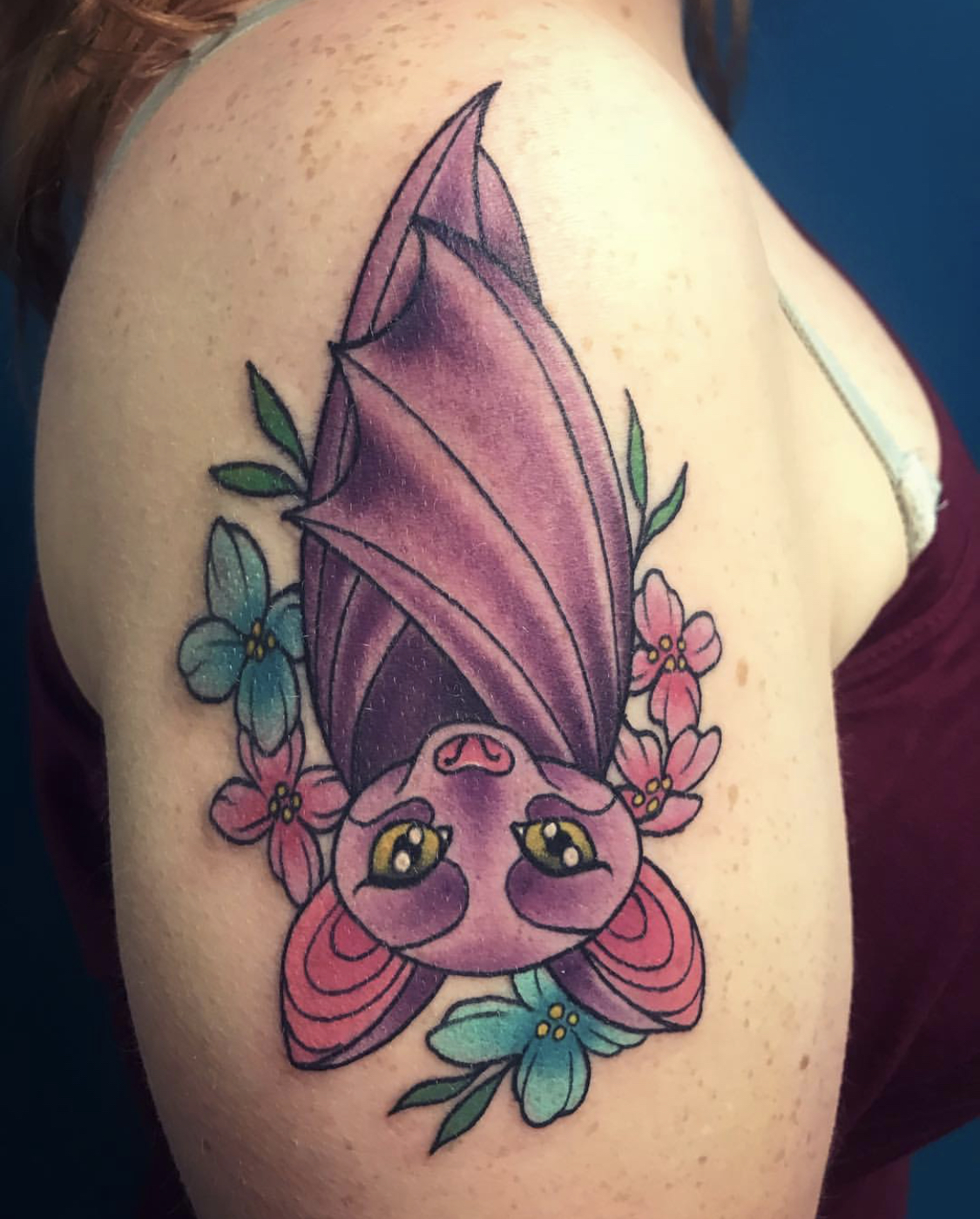 Colorful bat tattoo