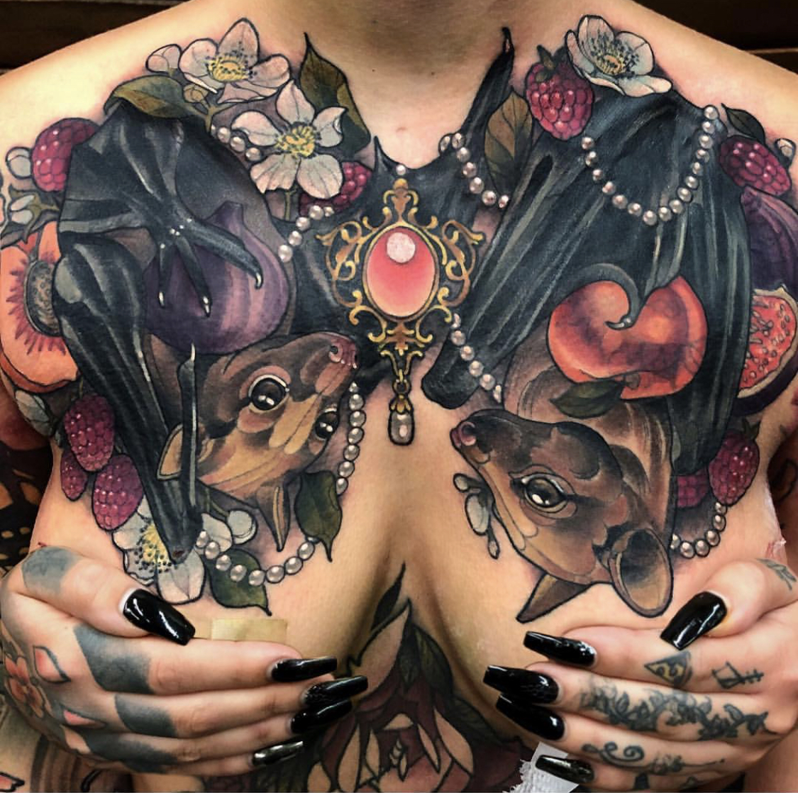 Bat chestpiece tattoo
