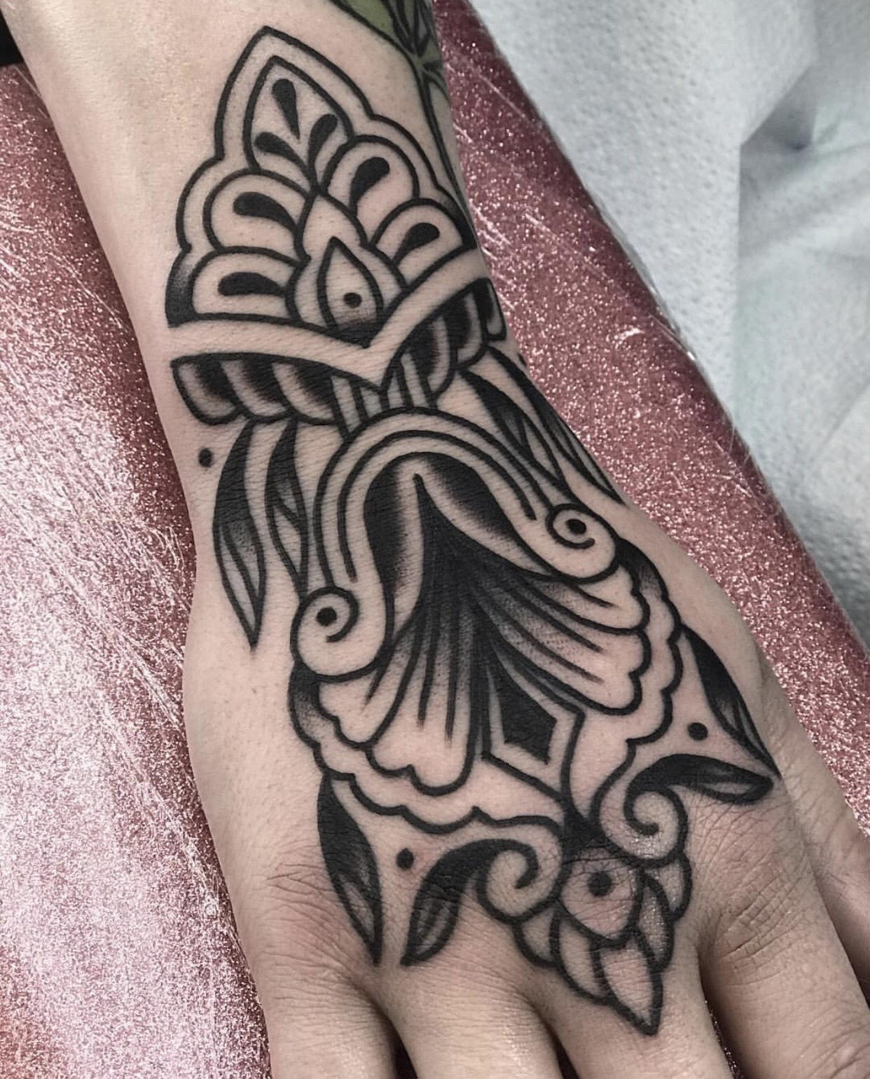 Ornamental tattoo by Tasha Tonks