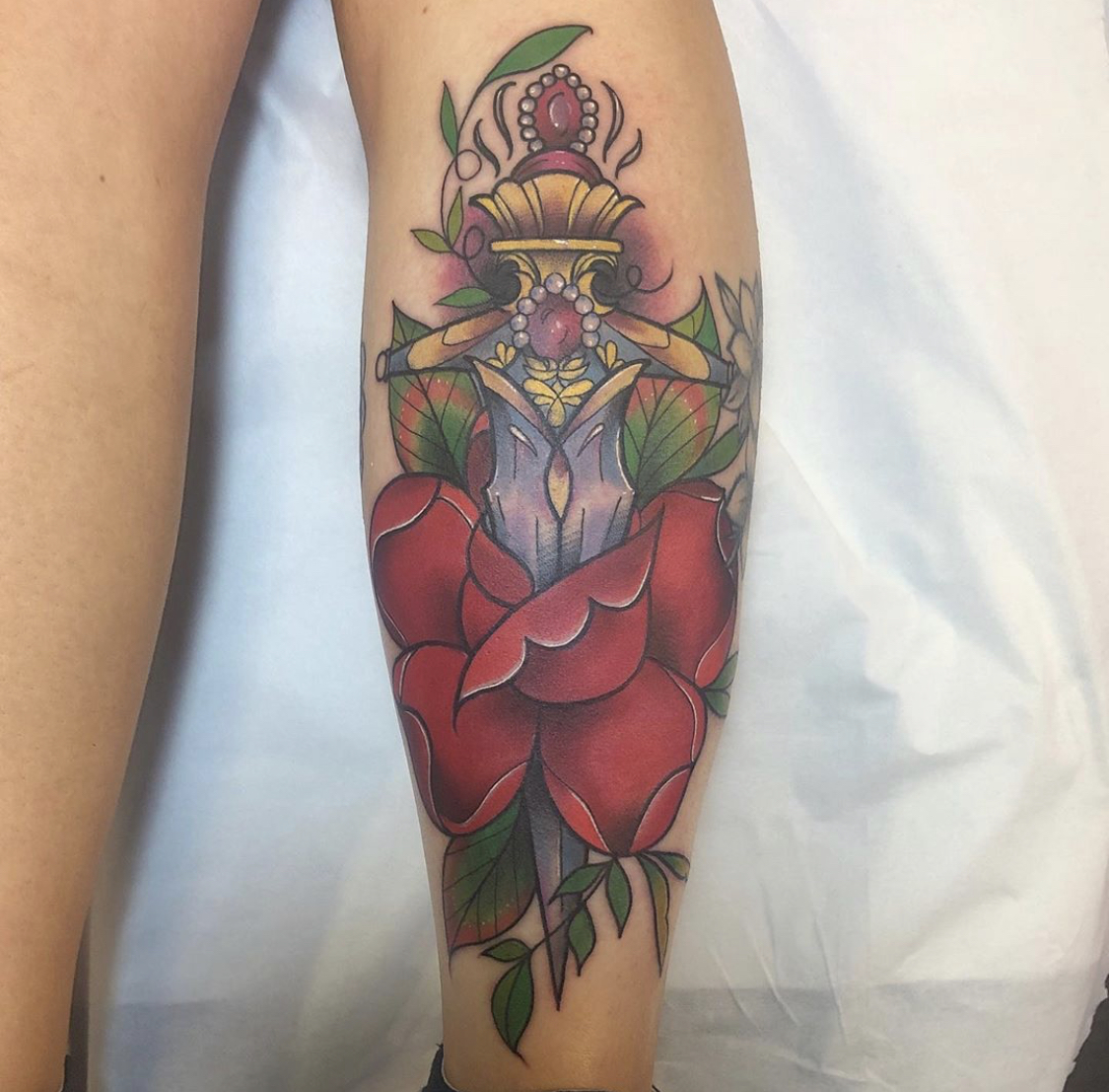 Dagger and rose tattoo by Cal
