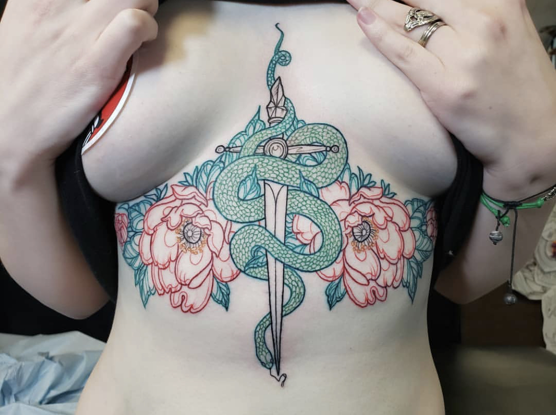 Sternum snake tattoo by Alicia Jagels