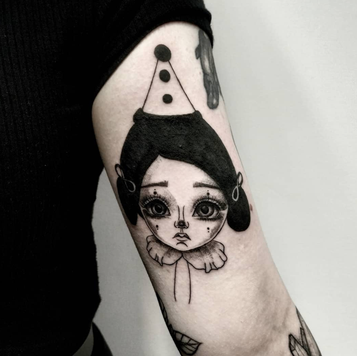 Sad clown tattoo by Renata Kiraly