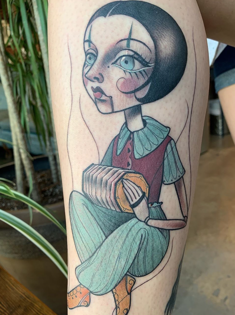 Marionette tattoo by Sandi Calistro