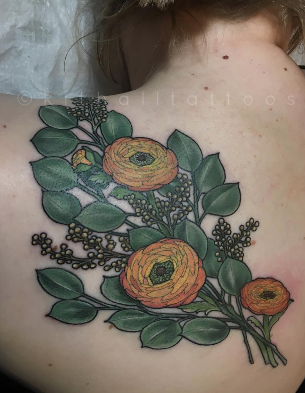 Floral tattoo by Kit Evans