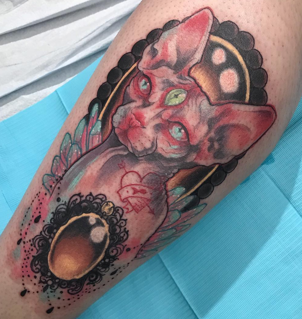 Hairless cat tattoo by Kate Erso