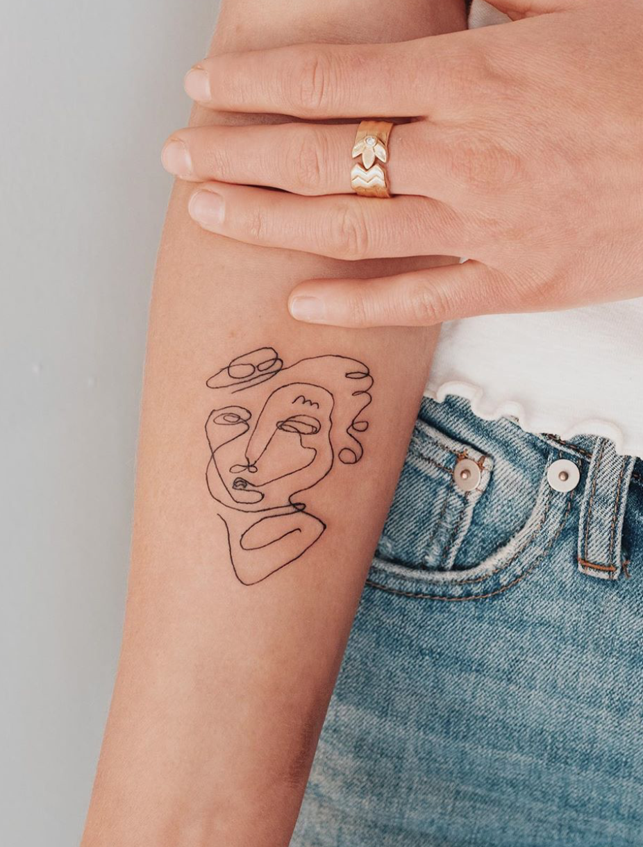 face tattoo by Chloe Besson