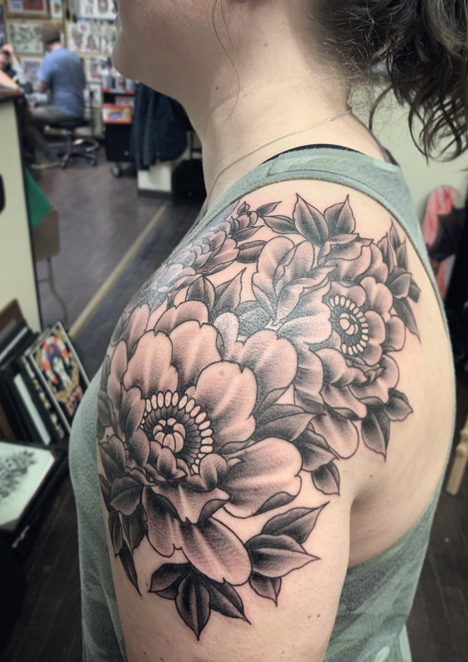 shoulder tattoo by Hannah Greenstein