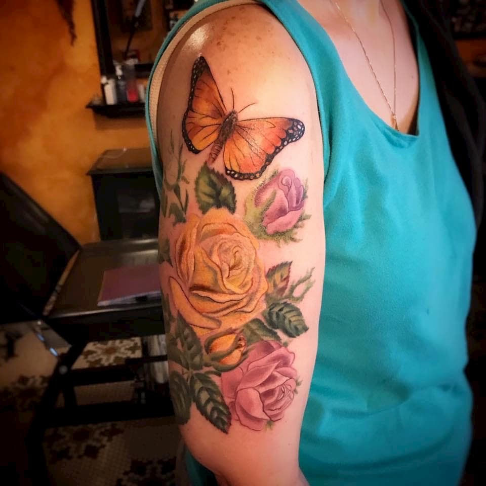 Tara Morgan floral butterfly tattoo